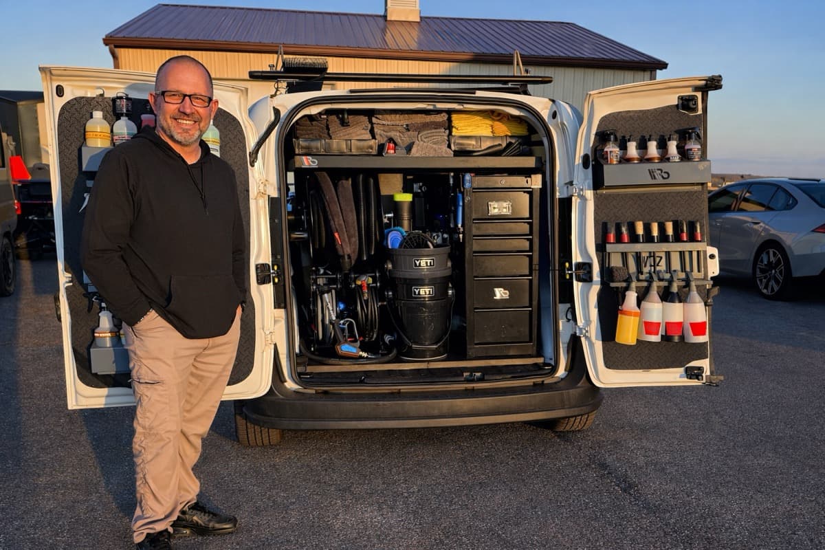 Jeff, owner of Fallout Auto Detailing, standing next to his fully-equipped mobile detailing van